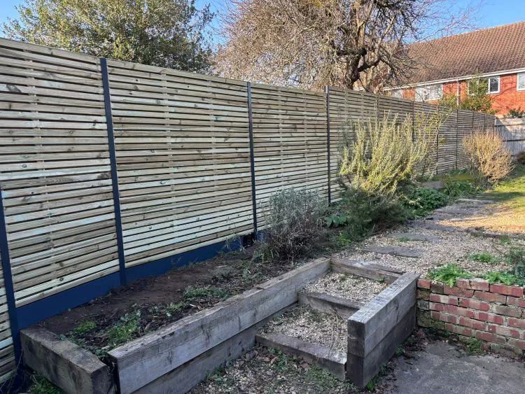 Double-slatted timber panels with Durapost posts